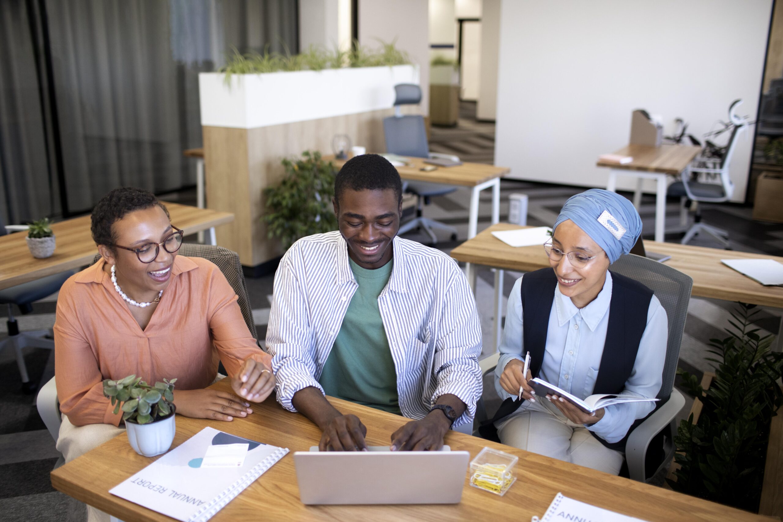 male-employee-getting-used-his-new-office-job-along-with-female-colleagues